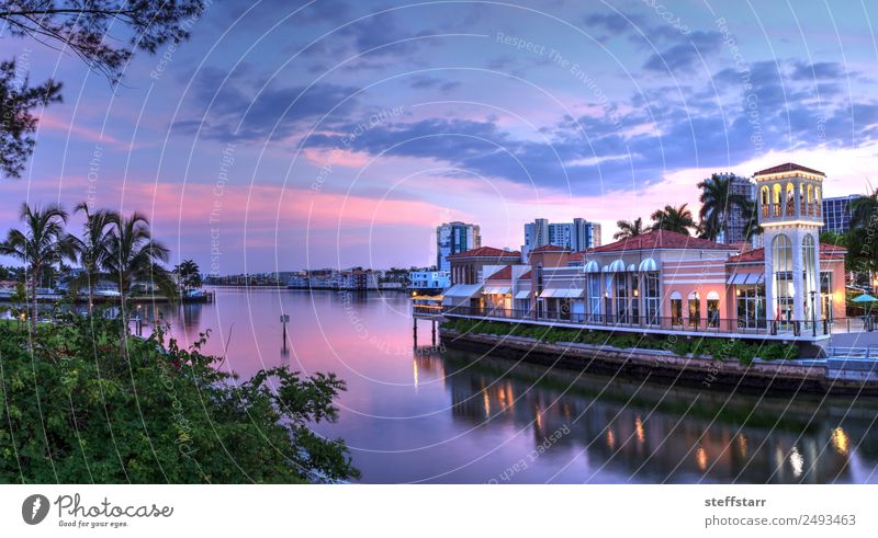 Pink Sunset over the colorful shops of the Village Shopping Luxury Beautiful Vacation & Travel Ocean Night life Restaurant Nature Sky Clouds Coast River