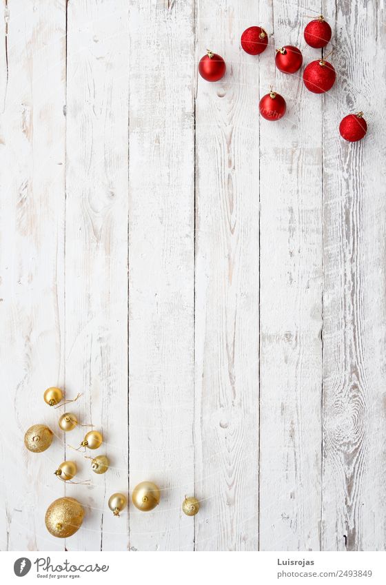 red and golden christmas balls on white wood Wood Gold Plastic Ornament Sphere Feasts & Celebrations To enjoy Friendliness Happiness Navidad adorno navideño