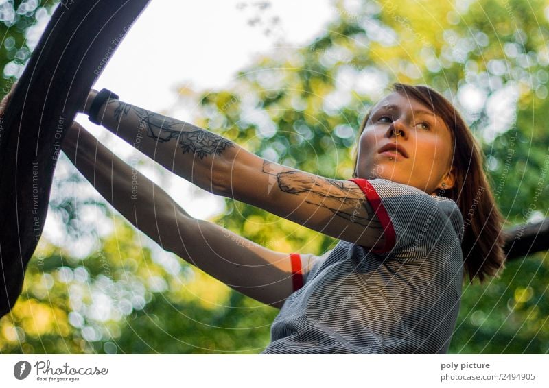 [LS102] - Young woman with tattoo on her arm in the park Lifestyle Wellness Well-being Contentment Relaxation Cure Leisure and hobbies Hiking Going out Feminine