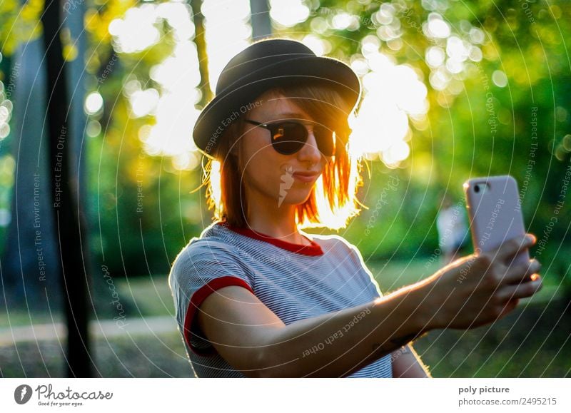 [LS103] - Young woman with a hat makes a selfie in the park PDA Feminine Youth (Young adults) Adults Life Human being 18 - 30 years Contentment Pride Addiction