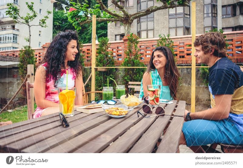 Group of people having fun in a summer day Vegetable Fruit Beverage Lifestyle Joy Happy Beautiful Leisure and hobbies Vacation & Travel Summer Garden Table