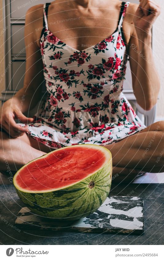 Half watermelon in front of beautiful woman with floral dress Food Fruit Nutrition Eating Diet Lifestyle Happy Beautiful Body Healthy Summer Human being Woman