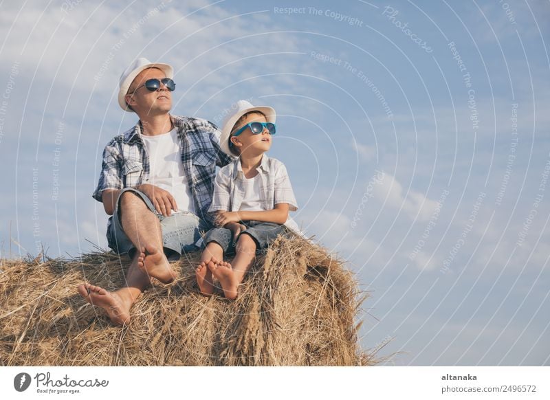 Father and son playing in the park at the day time. Lifestyle Joy Happy Leisure and hobbies Playing Vacation & Travel Freedom Summer Sports Child Human being