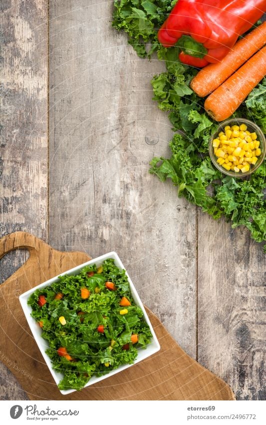 Kale salad and ingredients on wood Food Healthy Eating Food photograph Vegetable Lettuce Salad Nutrition Lunch Organic produce Vegetarian diet Diet Bowl