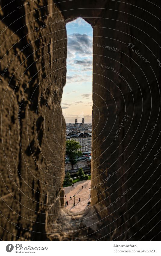 Narrow window in stone wall with view of Paris cityscape Vacation & Travel Tourism Culture Landscape Clouds Town Building Architecture Facade Street Stone Old