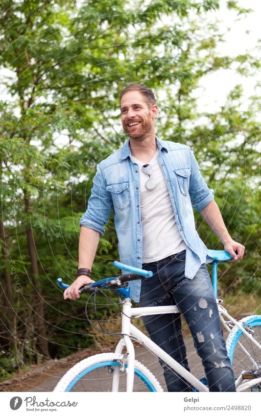 Casual guy Lifestyle Joy Happy Leisure and hobbies Vacation & Travel Summer Sports Cycling Human being Man Adults Nature Park Transport Street To enjoy Smiling