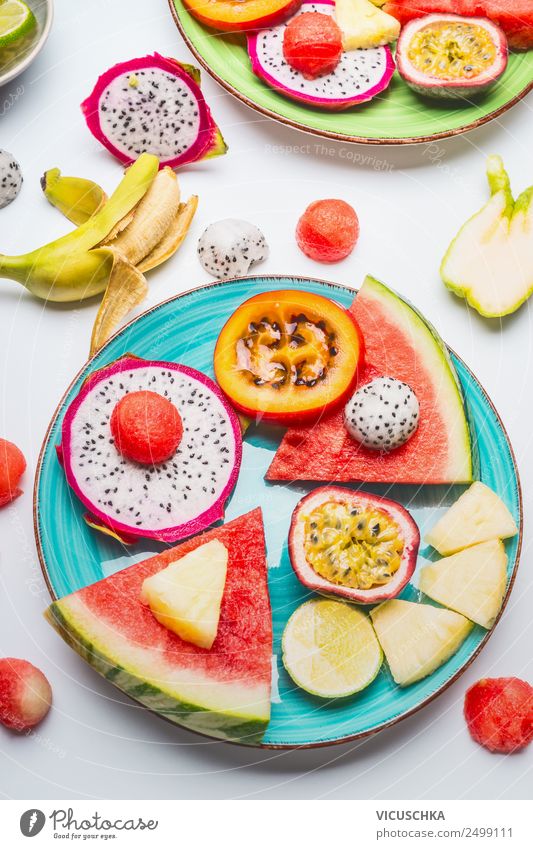 Tropical fruits on blue plate Food Fruit Dessert Style Design Healthy Healthy Eating Life Summer Mango Snack Water melon Pineapple Maracuja Exotic Plate Banana