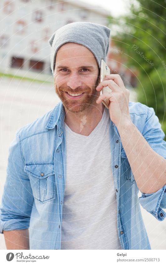 Casual guy Lifestyle Style Joy Happy Leisure and hobbies To talk Telephone PDA Technology Human being Man Adults Street Fashion Shirt Hat Beard Listening