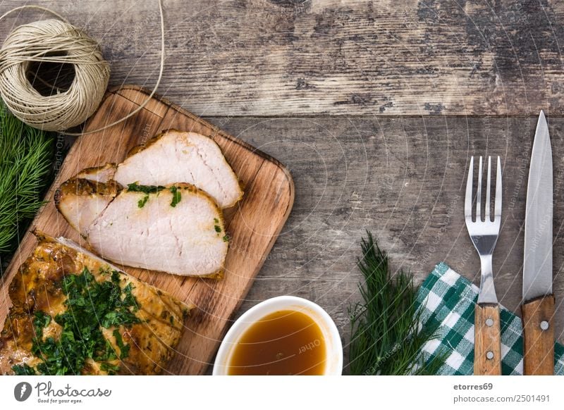 Roasted pork on wooden table Pork BBQ Barbecue (apparatus) Barbecue (event) Home-made Christmas & Advent Tradition Loin Meal Food Healthy Eating Food photograph