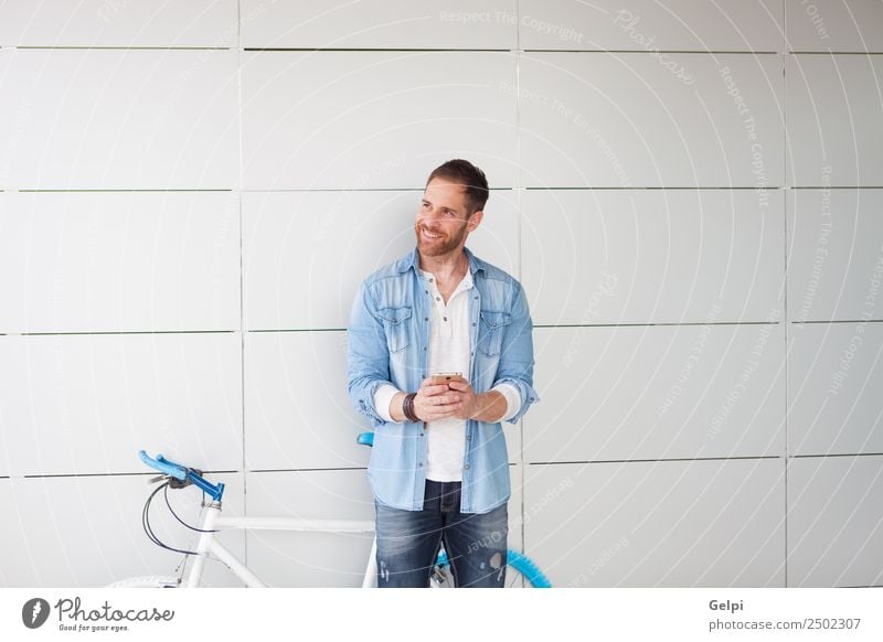 Casual guy Lifestyle Style Happy Music Business Telephone PDA Technology Human being Man Adults Street Beard Smiling Stand Retro Smart Blue young mobile bicycle