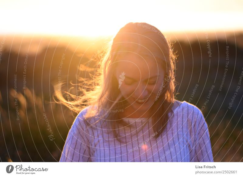 young woman, laughing looking at the ground, sunset Beautiful Vacation & Travel Tourism Young woman Youth (Young adults) 1 Human being 18 - 30 years Adults