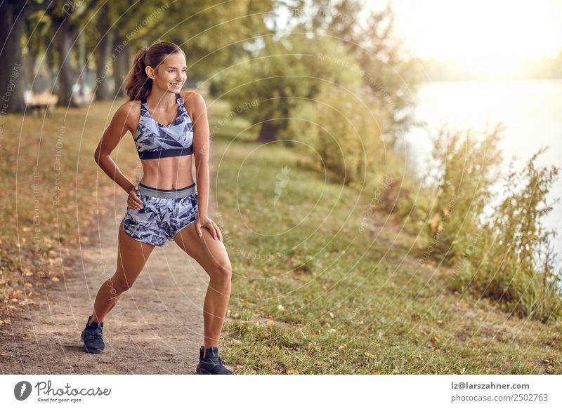 Fit muscular woman working out in a park Lifestyle Happy Beautiful Summer Sports Jogging Woman Adults 1 Human being 18 - 30 years Youth (Young adults) Nature