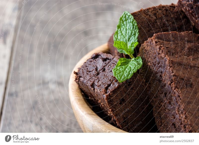 Chocolate brownie pieces on wooden background Brown Confectionary Sweet Candy Dessert Baked goods Cake nut walnuts Food Healthy Eating Food photograph Snack