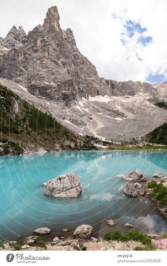 A magic place Vacation & Travel Trip Adventure Summer vacation Mountain Nature Landscape Clouds Rock Alps Dolomites Peak Lakeside Lake Sorapis glacial lake