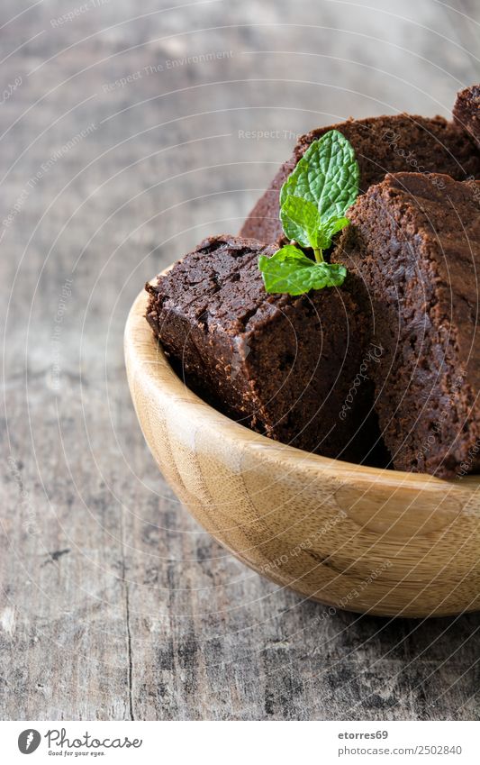 Chocolate brownie pieces on wooden background Brown Confectionary Sweet Candy Dessert Baked goods Cake nut Walnut Food Healthy Eating Food photograph Snack