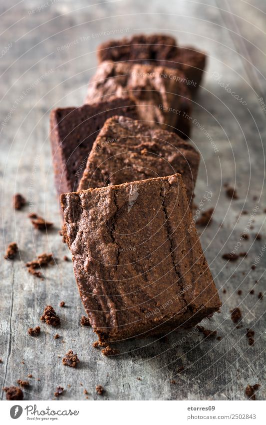 Chocolate brownie pieces on wooden background Brown Confectionary Sweet Candy Dessert Baked goods Cake nut walnuts Food Healthy Eating Food photograph Snack