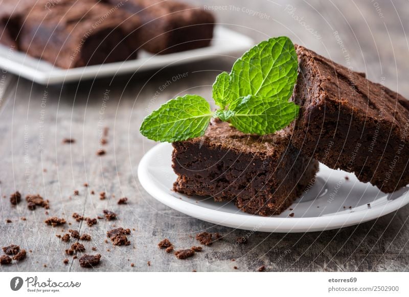 Chocolate brownie pieces on wooden background Brown Confectionary Sweet Dessert Baked goods Cake nut walnuts Food Food photograph Snack Delicious Baking Tasty