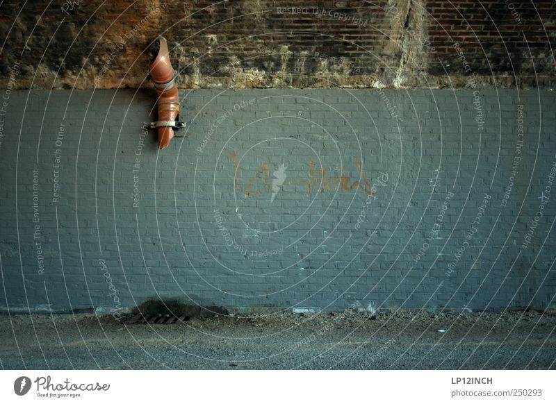 Graffiti free space Luneburg Wall (barrier) Wall (building) Facade Brick Dirty Dark Disgust Cold Gloomy Conduit Drainpipe Gully Broken Divide Daub Colour photo