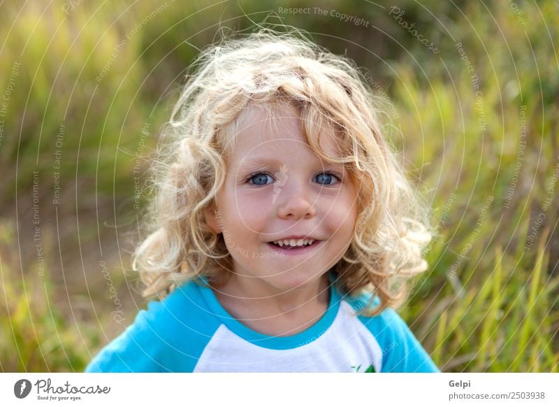 Small child with long blond hair enjoying of a sunny day Happy Beautiful Face Summer Child Human being Baby Boy (child) Man Adults Infancy Environment Nature