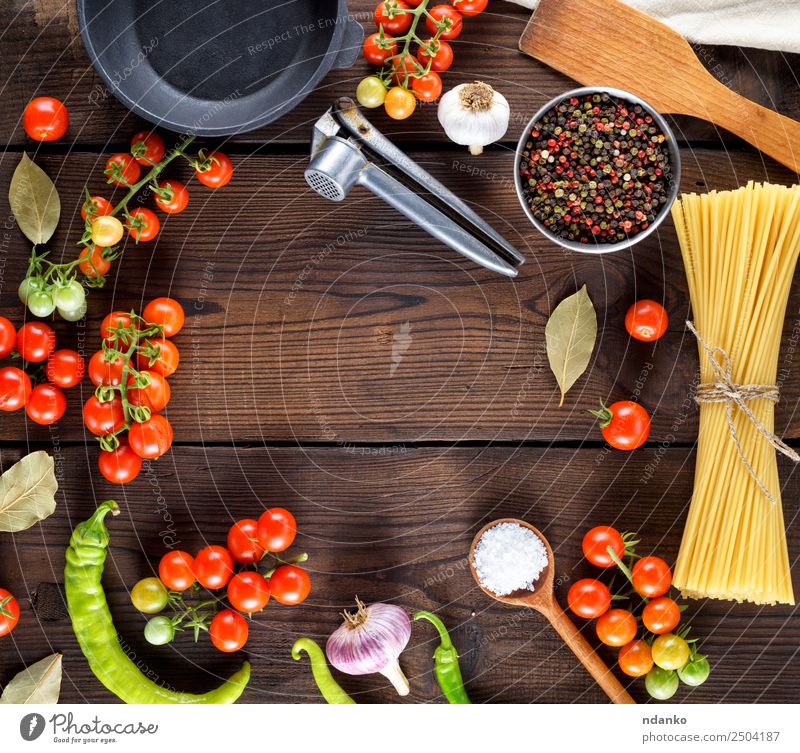 ingredients for cooking food Vegetable Dough Baked goods Herbs and spices Lunch Italian Food Pan Spoon Wood Eating Fresh Large Long Above Brown Yellow Red Black