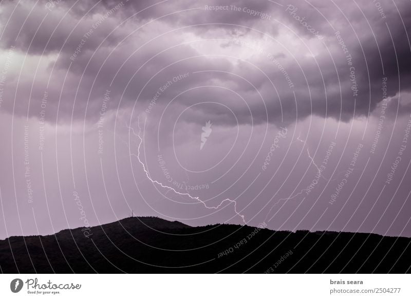 Lightning strike during a thunderstorm. Education Science & Research Environment Nature Elements Earth Sky Clouds Storm clouds Night sky Climate Climate change