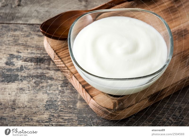 Greek yogurt on wooden table Yoghurt Dairy Food Healthy Eating Food photograph Dish Breakfast curd Delicious Wood Glass Spoon Sweet Dessert Diet Nutrition