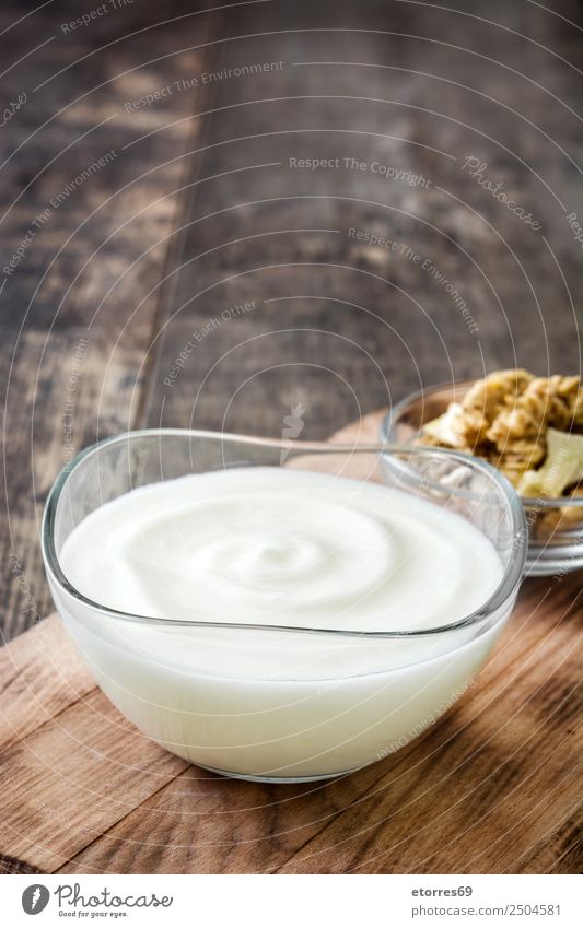 Greek yogurt on wooden table Yoghurt Dairy Healthy Eating Dish Food photograph Breakfast curd Delicious Wood Glass Spoon Sweet Dessert Diet Nutrition