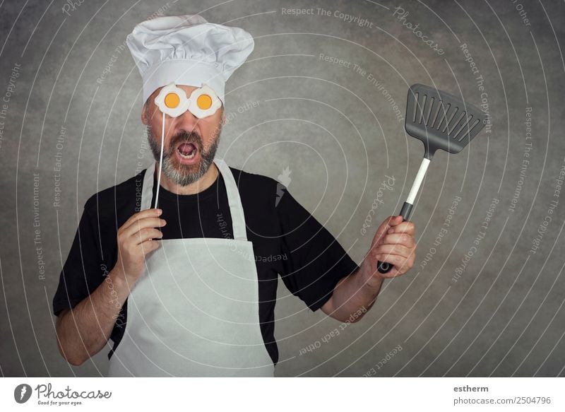 funny man with fried eggs in his eyes on gray background Nutrition Dinner Diet Cutlery Lifestyle Kitchen Restaurant Gastronomy Business Human being Masculine