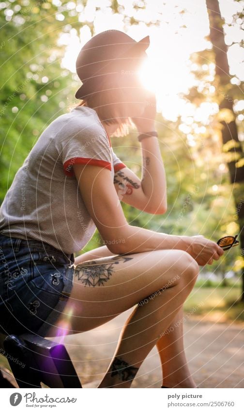 [LS116] - Young woman with tattoos on a park bench Lifestyle Joy Vacation & Travel Adventure Youth (Young adults) Adults 18 - 30 years 30 - 45 years Garden Park