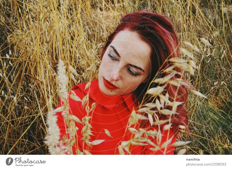 Young redhead woman in nature at autumn Lifestyle Elegant Style Beautiful Hair and hairstyles Face Senses Relaxation Human being Feminine Young woman