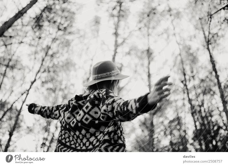 Woman opening arms while enjoys nature in a tree forest. Lifestyle Joy Wellness Harmonious Vacation & Travel Freedom Dance Human being Feminine Young woman