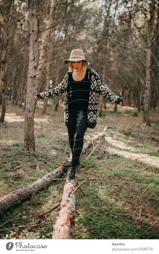 Woman walking on fallen tree trunk Lifestyle Leisure and hobbies Vacation & Travel Trip Adventure Freedom Mountain Hiking Human being Young woman