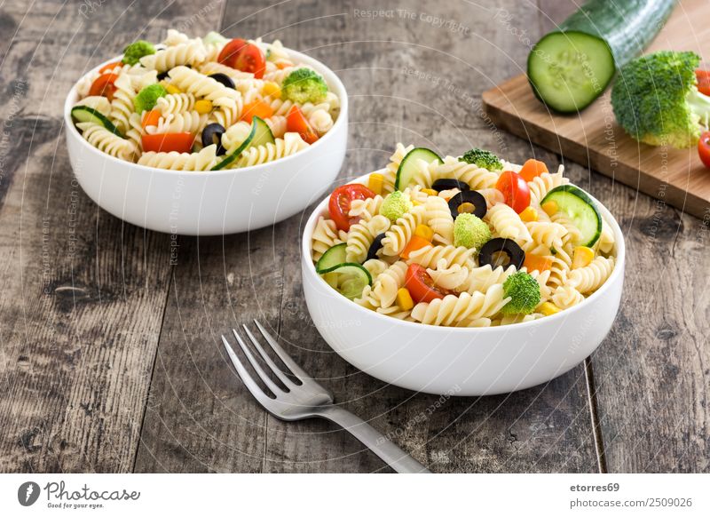 Pasta salad with vegetables in bowl Food Vegetable Lettuce Salad Dough Baked goods Nutrition Dinner Organic produce Vegetarian diet Diet Wood Natural