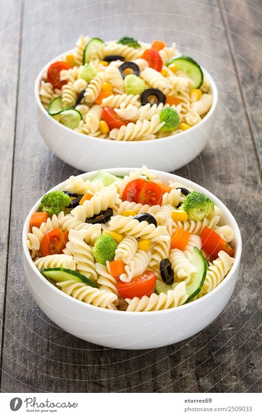 Pasta salad on wooden table. Food Healthy Eating Food photograph Dish Vegetable Lettuce Salad Dough Baked goods Nutrition Vegetarian diet Bowl Summer Fresh Good