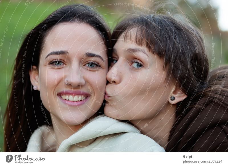 Nice sisters with blue eyes Lifestyle Joy Happy Beautiful Face Human being Woman Adults Sister Family & Relations Friendship Youth (Young adults) Teeth Park