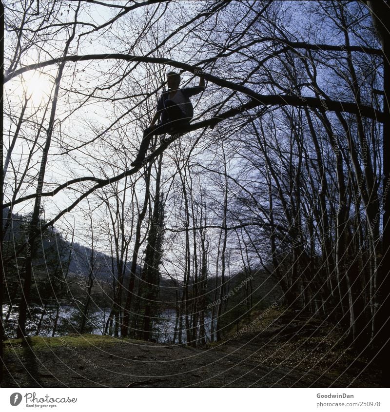 Adventure II Human being Masculine Man Adults 1 Environment Nature Elements Water Sky Weather Beautiful weather River bank To hold on Crouch Tall Dangerous