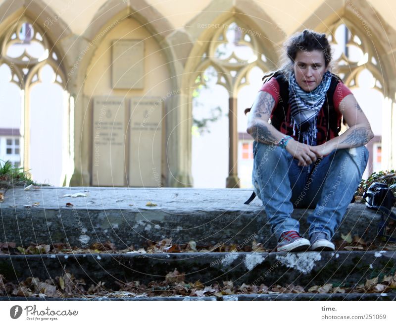 pause | ChamanSülz Relaxation Woman Adults 1 Human being Beautiful weather Leaf Facade Jeans Old Historic Break eye contact stagger Vault Vaulted arch Monastery