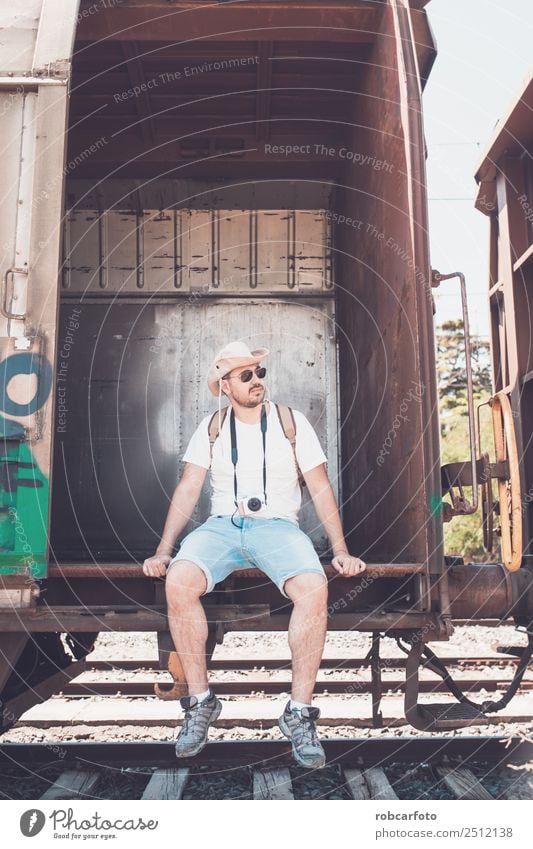 man traveling in train carriage Happy Vacation & Travel Business Human being Man Adults Transport Street Car Railroad Old Movement Modern White Dangerous