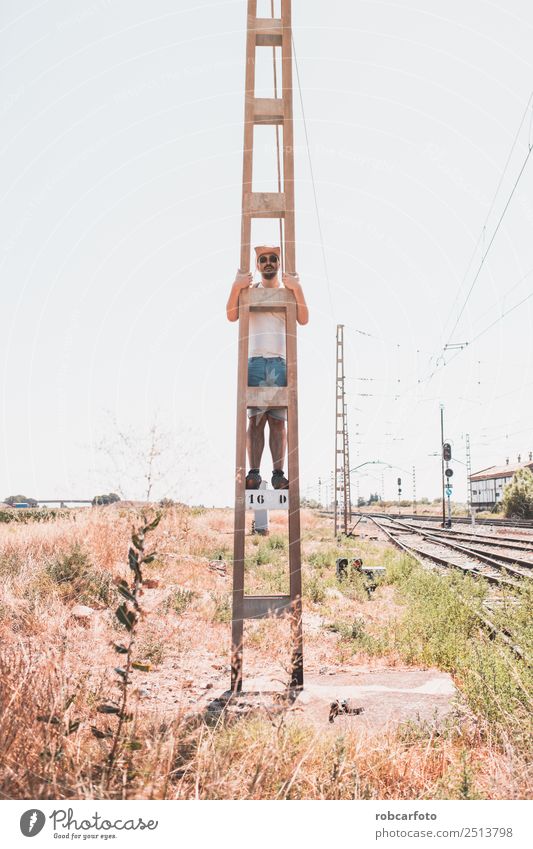 man climbed a metal tower Lifestyle Joy Happy Adventure Freedom Summer Mountain Sports Success Human being Man Adults Hand Nature Landscape Sky Jump Black White