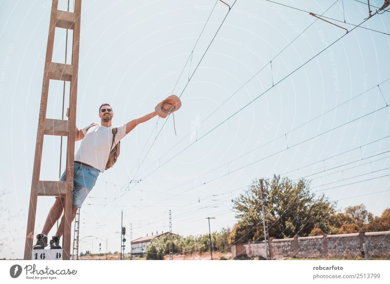 man climbed a metal tower Lifestyle Joy Happy Adventure Freedom Summer Mountain Sports Success Human being Man Adults Hand Nature Landscape Sky Jump Black White