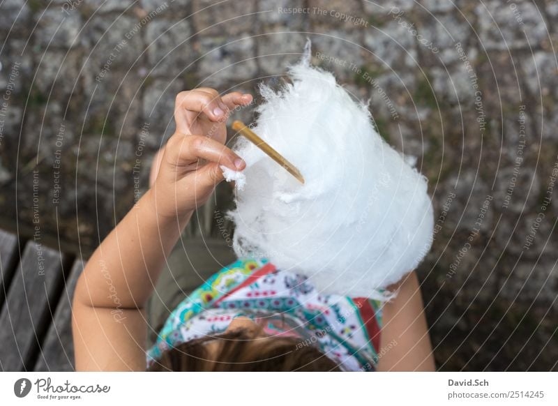 Girl plucks off a piece of cotton candy Candy Cotton candy Eating Human being Child Hand 1 3 - 8 years Infancy Touch To enjoy Multicoloured Gray White Plucking