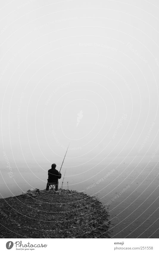 fisherman Masculine 1 Human being 45 - 60 years Adults Elements Water Sky Autumn Bad weather Fog North Sea Baltic Sea Ocean Lake Dark Cold Gloomy Gray Sit