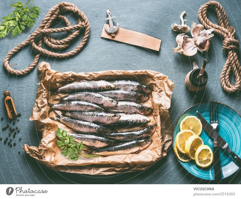 Sardines on the kitchen table with ingredients Food Fish Nutrition Lunch Dinner Buffet Brunch Organic produce Vegetarian diet Crockery Plate Cutlery Style