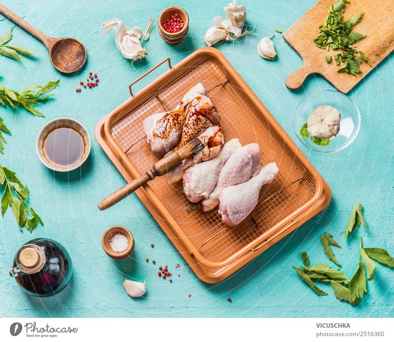 Preparing marinated chicken legs Food Meat Herbs and spices Cooking oil Nutrition Lunch Dinner Organic produce Diet Crockery Style Design Living or residing