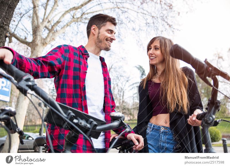 romantic couple in the street Lifestyle Joy Happy Beautiful Vacation & Travel Tourism Human being Woman Adults Friendship Couple Smiling Love Happiness bike