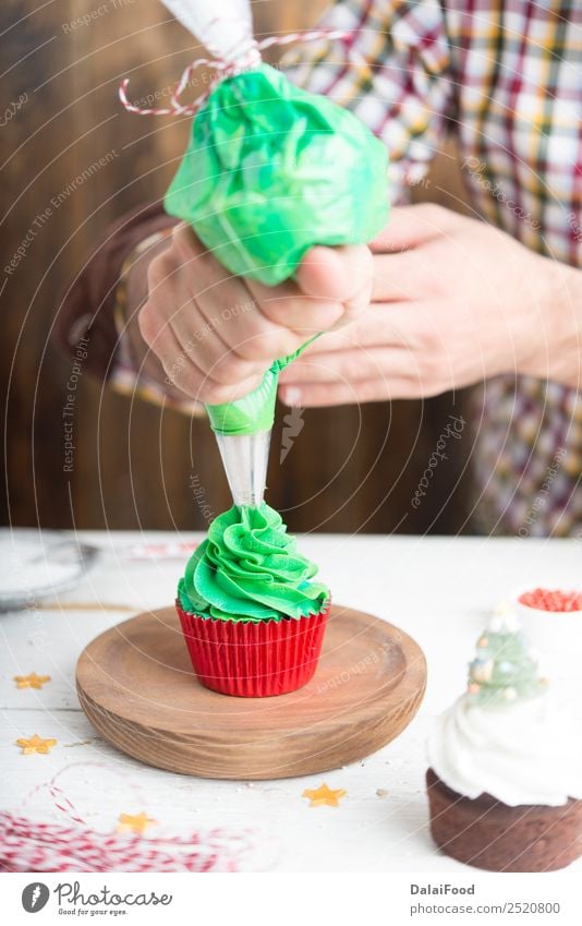 Making cupcake for christmas time Baking Cake Candy Feasts & Celebrations Christmas & Advent Cup Cupcake Decoration Dessert Festive Food Frost Gift Green Home