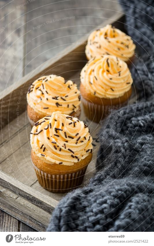 Autumn cupcakes on tray wooden Cupcake Thanksgiving Feasts & Celebrations Public Holiday Dessert Sweet Butter Muffin Seasons Holiday season Orange background