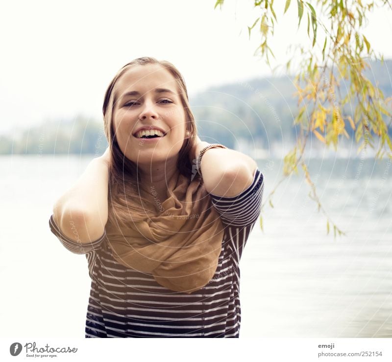 savour Feminine Young woman Youth (Young adults) 1 Human being 18 - 30 years Adults Beautiful Laughter To enjoy Autumnal Narrowed Colour photo Exterior shot Day