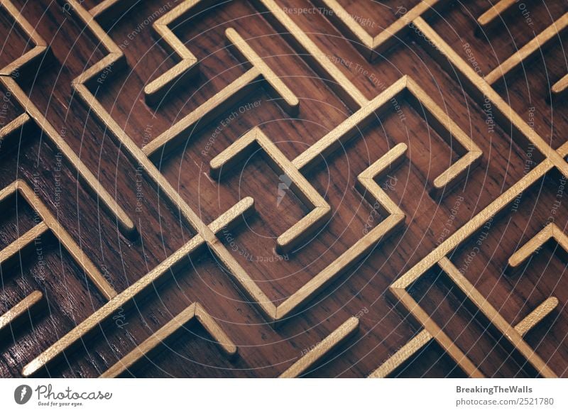 Close up of brown wooden labyrinth maze Leisure and hobbies Playing Toys Wood Dark Brown Complex Competition Creativity Problem solving Planning Labyrinth Maze