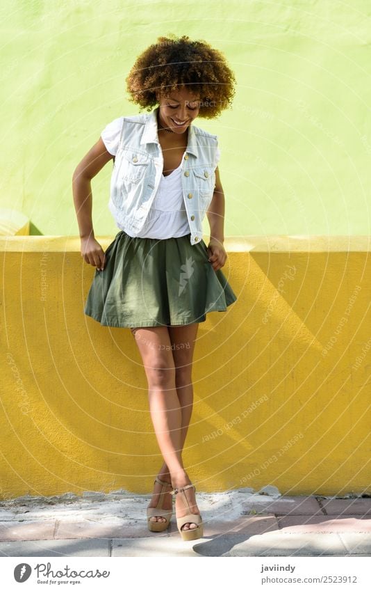 Young black woman, afro hairstyle, standing in the street Lifestyle Style Happy Beautiful Hair and hairstyles Face Human being Feminine Young woman